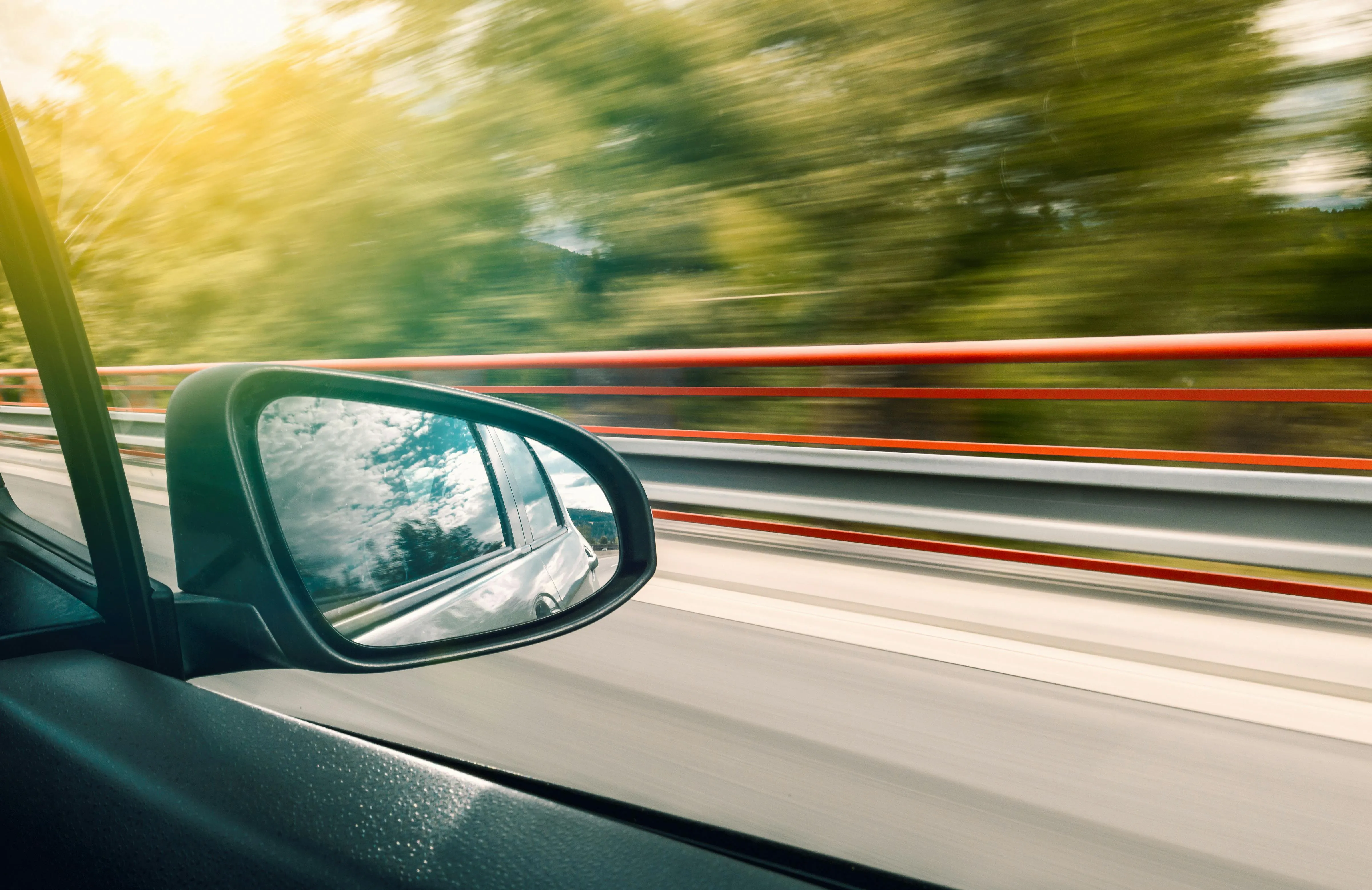 Wing mirror of car travelling fast