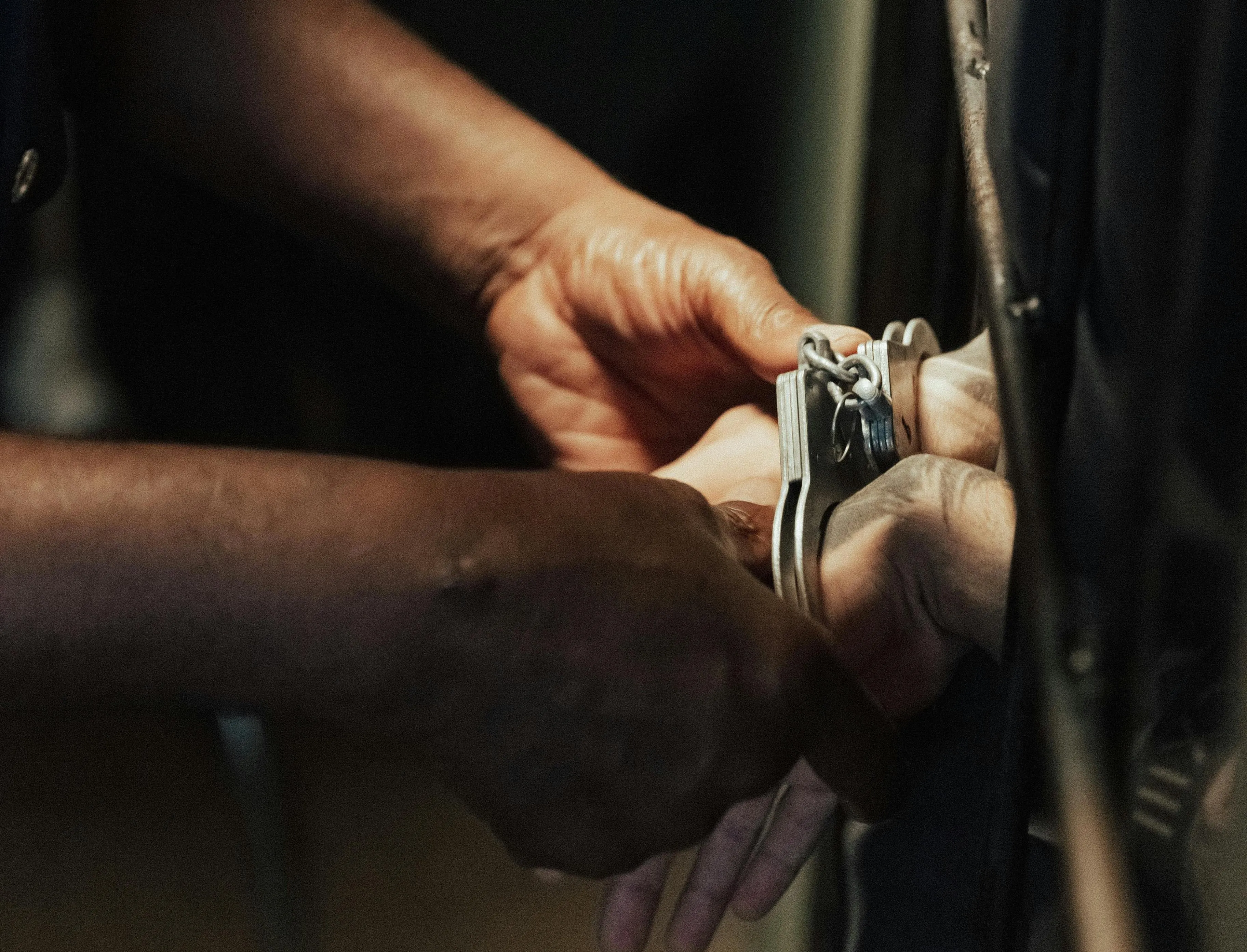 Handcuffs being applied at Prison